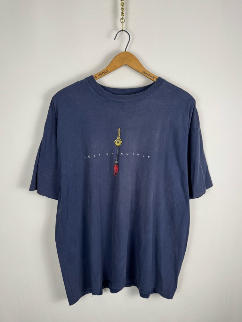 Vintage 90s Mossimo Navy Graphic Tee with Yellow Key and Red Tassel